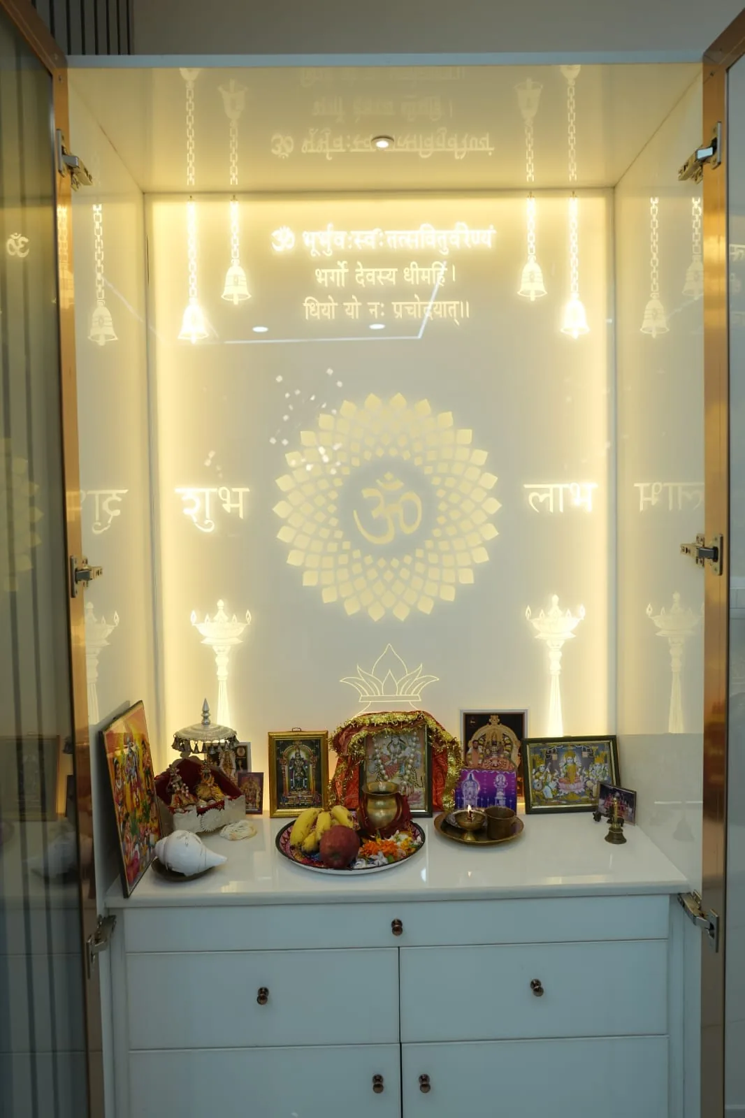 Backlit pooja unit with etched glass shutters