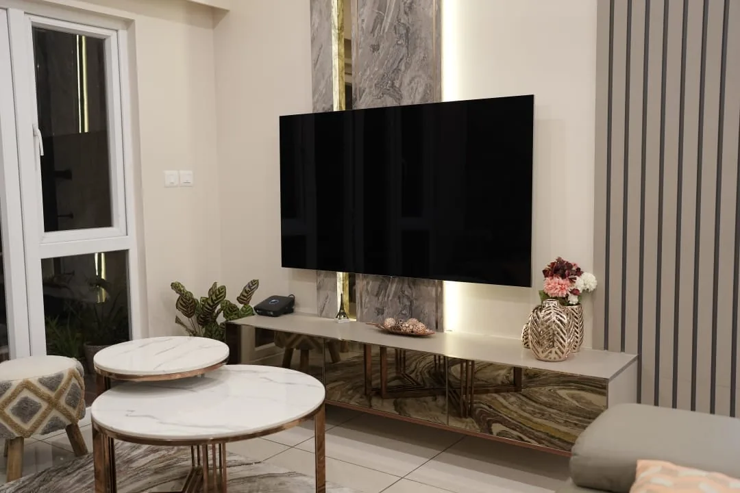 Living room TV console with fluted wall panelling